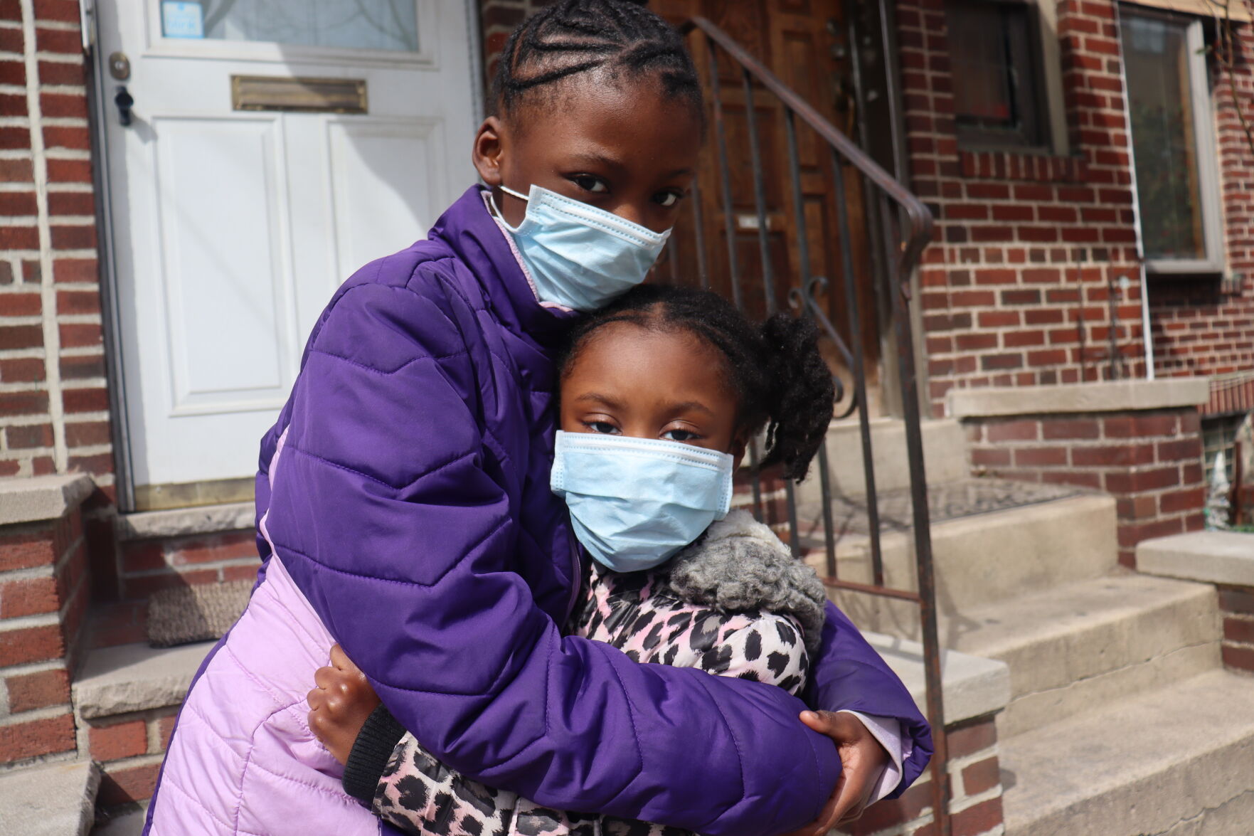 Girls wearing surgical masks